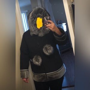 Custom made in Nunavut, Newfoundland materials on cuff, hood and edge, New